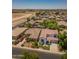 Aerial view of the neighborhood, showing a home with mature landscaping at 567 E Tropical Dr, Casa Grande, AZ 85122
