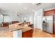 Modern kitchen boasts granite countertops, stainless steel appliances, and tile flooring at 567 E Tropical Dr, Casa Grande, AZ 85122