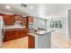 Modern kitchen boasts granite countertops, stainless steel appliances, and tile flooring at 567 E Tropical Dr, Casa Grande, AZ 85122