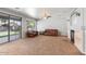 Spacious living room with carpet flooring, fireplace, and sliding glass doors to the backyard at 567 E Tropical Dr, Casa Grande, AZ 85122
