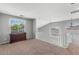 Spacious loft area with carpet, lots of light, and views of the backyard at 567 E Tropical Dr, Casa Grande, AZ 85122