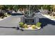Ironwood at Red Mountain entrance with manicured landscaping and community signage at 5815 E Nora St, Mesa, AZ 85215