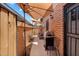 Inviting back patio with outdoor seating, a grill, and shade umbrellas, perfect for entertaining at 6416 S Kenneth Pl # D, Tempe, AZ 85283