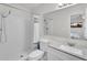 Clean and modern bathroom with tile shower, vanity and mirror at 6416 S Kenneth Pl # D, Tempe, AZ 85283