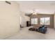Spacious bedroom boasts vaulted ceiling, neutral carpet, and ample natural light at 6516 E Rochelle St, Mesa, AZ 85215