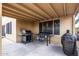 Covered outdoor patio featuring two grills perfect for outdoor cooking and entertaining at 6516 E Rochelle St, Mesa, AZ 85215