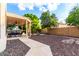 Enjoy the backyard with dining and relaxing under the covered patio at 7029 E Monte Cir, Mesa, AZ 85209