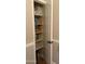 Well-organized pantry with shelving for ample storage of household goods and supplies at 7029 E Monte Cir, Mesa, AZ 85209