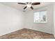 Bedroom featuring natural light and tile flooring at 7047 W Almeria Rd, Phoenix, AZ 85035