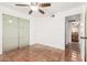 Bedroom with views to bath at 7047 W Almeria Rd, Phoenix, AZ 85035