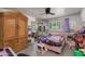 Bright bedroom with a large wardrobe, mirrored sliding closet doors and plenty of natural light at 7102 E Kalil Dr, Scottsdale, AZ 85254
