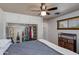 This bedroom features built-in wardrobe, a ceiling fan, and a window at 7102 E Kalil Dr, Scottsdale, AZ 85254
