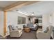 Spacious living room area featuring comfortable seating, neutral walls, and an open floor plan at 7102 E Kalil Dr, Scottsdale, AZ 85254