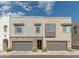 Modern home exterior with a two-car garage and well-maintained landscaping at 7330 E Vista Bonita Dr, Scottsdale, AZ 85255