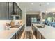 Contemporary kitchen boasting stainless steel appliances, custom cabinets, and a spacious island for entertaining at 7330 E Vista Bonita Dr, Scottsdale, AZ 85255