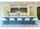 Beautiful kitchen with gray cabinets, white countertops, stainless steel appliances and pendant lighting at 7330 E Vista Bonita Dr, Scottsdale, AZ 85255