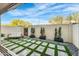 Charming outdoor patio with lush greenery, modern tile, and comfortable seating at 7330 E Vista Bonita Dr, Scottsdale, AZ 85255