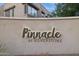 Community sign for Pinnacle at Silverstone on stucco wall, surrounded by desert landscaping at 7330 E Vista Bonita Dr, Scottsdale, AZ 85255