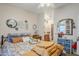 Relaxing bedroom featuring serene decor and access to an en-suite bathroom at 7807 E Main St # H-27, Mesa, AZ 85207