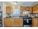 Well-organized kitchen with a gas range, plenty of cabinet space, and stainless steel appliances at 7807 E Main St # H-27, Mesa, AZ 85207