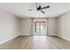 The living room features vinyl floors and sliding door access to the backyard at 818 W Earll Dr, Phoenix, AZ 85013