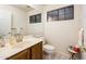 Bathroom with vanity, mirror, and tiled floor, providing a clean space at 8977 E Ludlow Dr, Scottsdale, AZ 85260