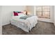 Bright bedroom with neutral carpet and a window bench at 8977 E Ludlow Dr, Scottsdale, AZ 85260