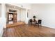 Open foyer with hardwood floors and views of the entrance, accented by columns at 8977 E Ludlow Dr, Scottsdale, AZ 85260