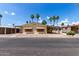 Charming single-story home featuring a covered carport and desert landscaping at 9302 E Broadway Rd # 45, Mesa, AZ 85208