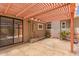 Covered patio area offers a relaxing outdoor space with ample sunlight and a stone paver flooring at 9603 N 1St Ave, Phoenix, AZ 85021