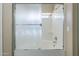 Clean bathroom with a frosted glass shower door and bathtub, providing comfort at 1026 E Julie Ave, San Tan Valley, AZ 85140