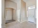 Bright foyer featuring tile floors, neutral paint and vaulted ceilings at 1026 E Julie Ave, San Tan Valley, AZ 85140