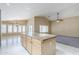 Open-concept living area boasting ample natural light and tile flooring at 1026 E Julie Ave, San Tan Valley, AZ 85140