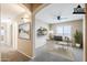 This home office area has natural light and is set up for remote work at 1026 E Julie Ave, San Tan Valley, AZ 85140