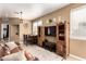 Spacious living room featuring natural light, dining area, rustic furniture and tile floors at 1130 E Ferrara St, San Tan Valley, AZ 85140