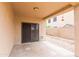 Covered patio with tiled flooring and outdoor access to backyard at 11419 E Ellis St, Mesa, AZ 85207