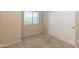 Cozy bedroom with neutral walls, carpet, and a large closet at 11419 E Ellis St, Mesa, AZ 85207