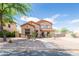 Inviting two-story home with low-maintenance desert landscaping in a desirable neighborhood at 11419 E Ellis St, Mesa, AZ 85207