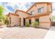 Charming two-story home with desert landscaping, neutral colors, and a welcoming entrance at 11419 E Ellis St, Mesa, AZ 85207
