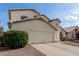 View of home's side showcasing a driveway and partial view of the front exterior at 1421 E Charleston Ave, Phoenix, AZ 85022