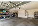 Spacious garage with ample storage shelving and concrete flooring at 1421 E Charleston Ave, Phoenix, AZ 85022