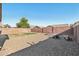 Private backyard with mature tree providing shade and privacy at 15453 W Shangri La Rd, Surprise, AZ 85379