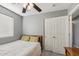 Bedroom featuring a neutral colored wall, large closet, and standard size bed with carpeted floor at 15453 W Shangri La Rd, Surprise, AZ 85379