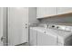 Functional laundry room with a washing machine and dryer, providing convenience for laundry tasks at 15453 W Shangri La Rd, Surprise, AZ 85379