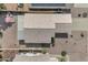 A top-down view of a roof on a single-story home with a covered patio at 15470 W Mauna Loa Ln, Surprise, AZ 85379