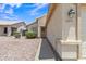 Charming single-story home with desert landscaping, and light colored stucco in a well-maintained community at 15470 W Mauna Loa Ln, Surprise, AZ 85379