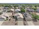 Aerial view of a single-story home with a desert landscape surrounded by similar homes at 15470 W Mauna Loa Ln, Surprise, AZ 85379