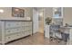 Comfortable home office with a large desk, perfect for getting work done at home at 15470 W Mauna Loa Ln, Surprise, AZ 85379