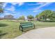 Enjoy this green neighborhood park featuring a resting bench and walking paths at 15470 W Mauna Loa Ln, Surprise, AZ 85379