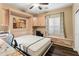 This bedroom features a built-in murphy bed, custom cabinets, granite desktop and a comfortable window seat at 16375 W Cortez St, Surprise, AZ 85388